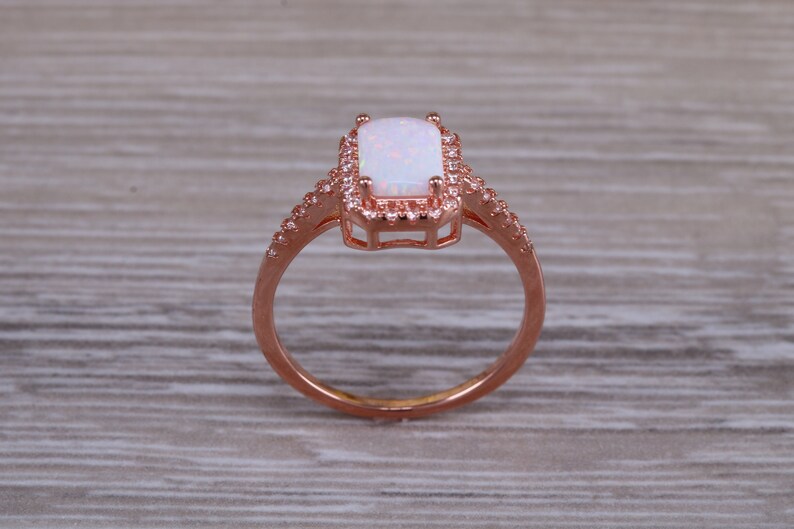 solid sterling silver ring further 18ct rose gold plated Very sparkly and fiery Opal and cubic zirconia set dress ring