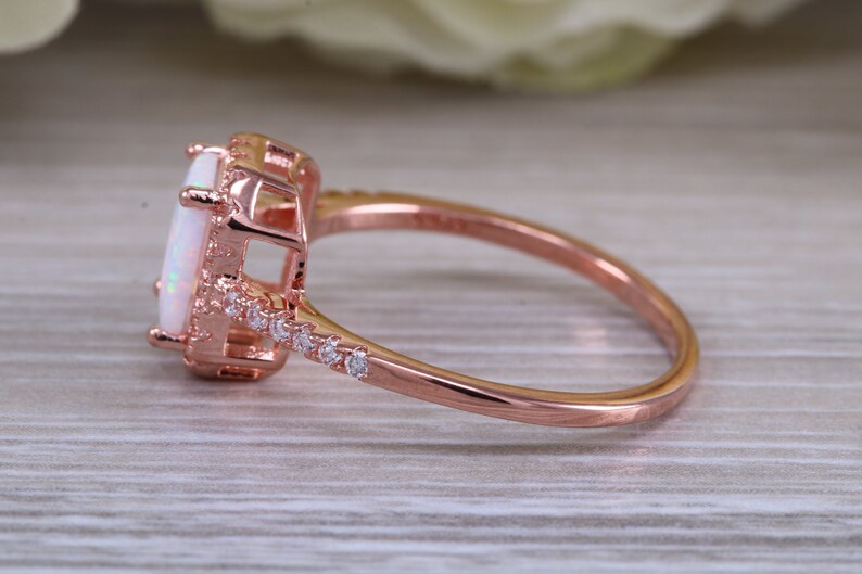 solid sterling silver ring further 18ct rose gold plated Very sparkly and fiery Opal and cubic zirconia set dress ring
