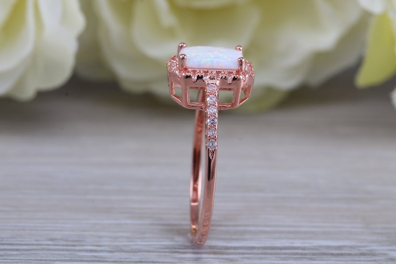 solid sterling silver ring further 18ct rose gold plated Very sparkly and fiery Opal and cubic zirconia set dress ring