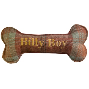 Handmade orange warm spice tartan bone toy. personalised name embroidery in gold thread.