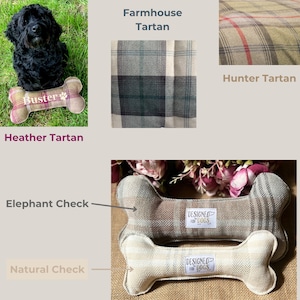 cute cockerpoo dog sat with colour fabric options for handmade dog bone toys: heather tartan (burgundy , khaki green and brown) farmhouse tartan  ( blues & creams ) hunter tartan ( khaki green, browns and red) elephant check (greys & taupe )