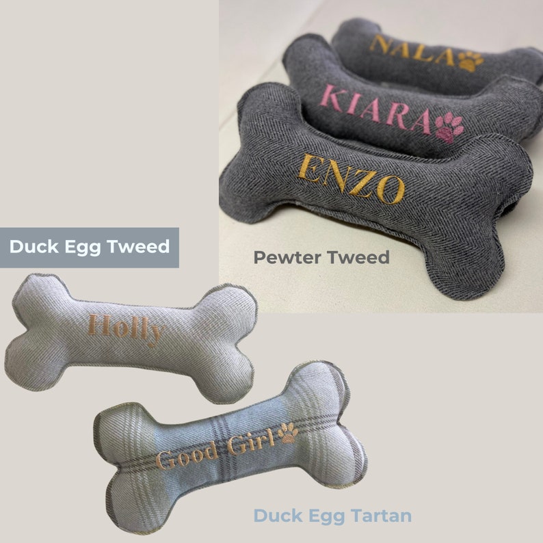handmade dog bone toys in pewter herringbone tweed, duck egg herringbone tweed and duck egg tartan. personalised name embroidery in gold thread.