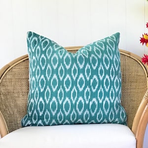 Natural dye, handwoven ikat Pillow in Turquoise with white ikat circles. Contemporary ikat design for coastal beach - Boho Bohemian cushion.