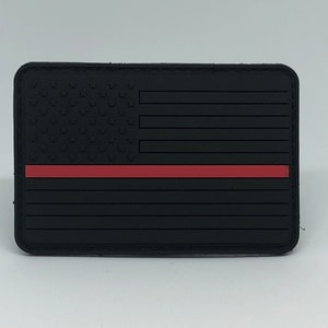 May include: Black and red American flag patch with a thin red line across the middle.
