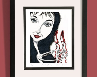 May include: A black and white caricature drawing of a woman with dark hair and red shoes tied together with a red ribbon. The drawing is titled "Rubberband Girl" and signed by Kate Bush and Sam Cope.