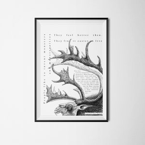 May include: Black and white framed art print featuring a detailed pen and ink drawing of a moose-like creature with large antlers. The artwork includes text that reads "People like to invent monsters and monstrosities."