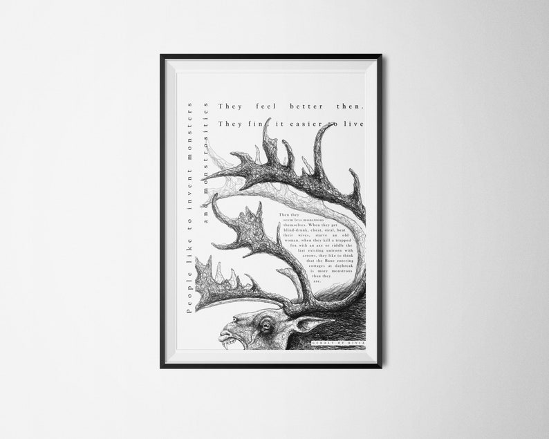 May include: Black and white framed art print featuring a detailed pen and ink drawing of a moose-like creature with large antlers. The artwork includes text that reads "People like to invent monsters and monstrosities."