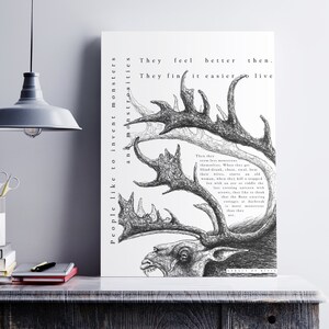May include: Black and white art print featuring a detailed pen and ink drawing of a stag with large antlers and text. The artwork has a gothic theme and is displayed on a white background.