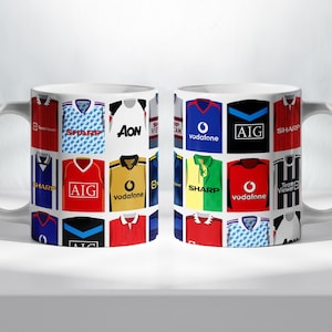 May include: Two white mugs with a collage of different soccer jerseys from the 1990s. The jerseys feature various sponsors, including AIG, Sharp, Vodafone, and Aon.