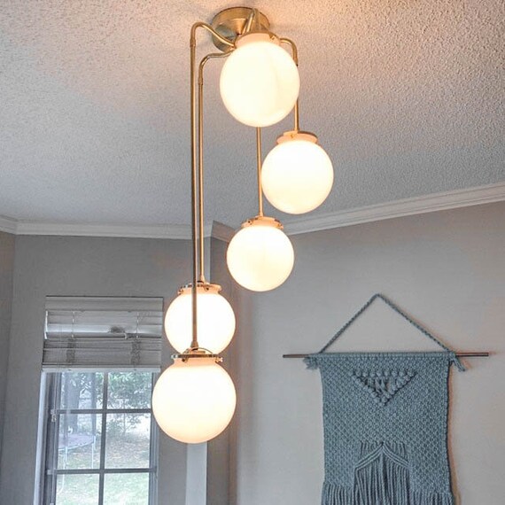 Brass hanging chandeliers deals
