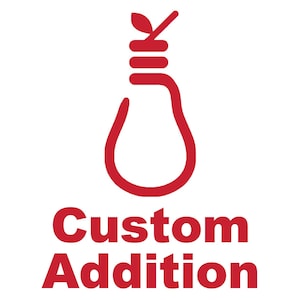 May include: Red illustration of a light bulb with a knotted rope at the top. The text "Custom Addition" is below the image.