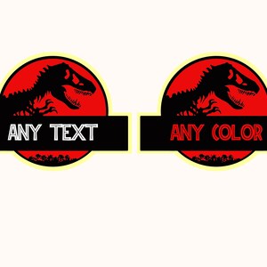 May include: Two red and yellow Jurassic Park logos with a black dinosaur silhouette. The top logo has the text "ANY TEXT" in white. The bottom logo has the text "ANY COLOR" in red.