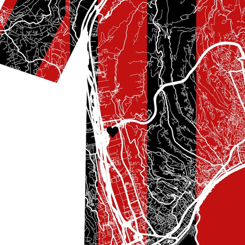 K&ouml;nnte beinhalten: Ein schwarz-rotes Streifenmuster mit einem wei&szlig;en Umriss einer Stadtkarte. Ein kleines schwarzes Herz befindet sich in der Mitte der Karte.
