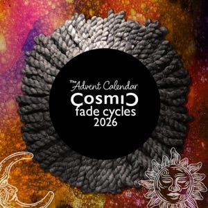 May include: A circular arrangement of grey yarn skeins surrounding a black center circle with white text reading The Advent Calendar Cosmic fade cycles 2026. The background features a vibrant orange, pink, and purple nebula-like pattern.