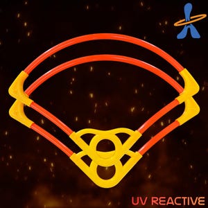 May include: A yellow and orange UV reactive sports toy. The toy has a unique design with two orange curved bars connected by yellow geometric shapes. The text "UV REACTIVE" is at the bottom.