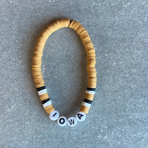 IOWA | yellow Iowa Hawkeyes bracelet • heishi beads bracelet • polymer clay disc • mens iowa bracelet • Hawks • womens iowa bracelet
