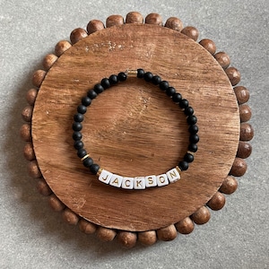 custom | black bracelet • white square letters • circle beaded bracelet • name bracelet • word bracelet • gold • silver • circle beads
