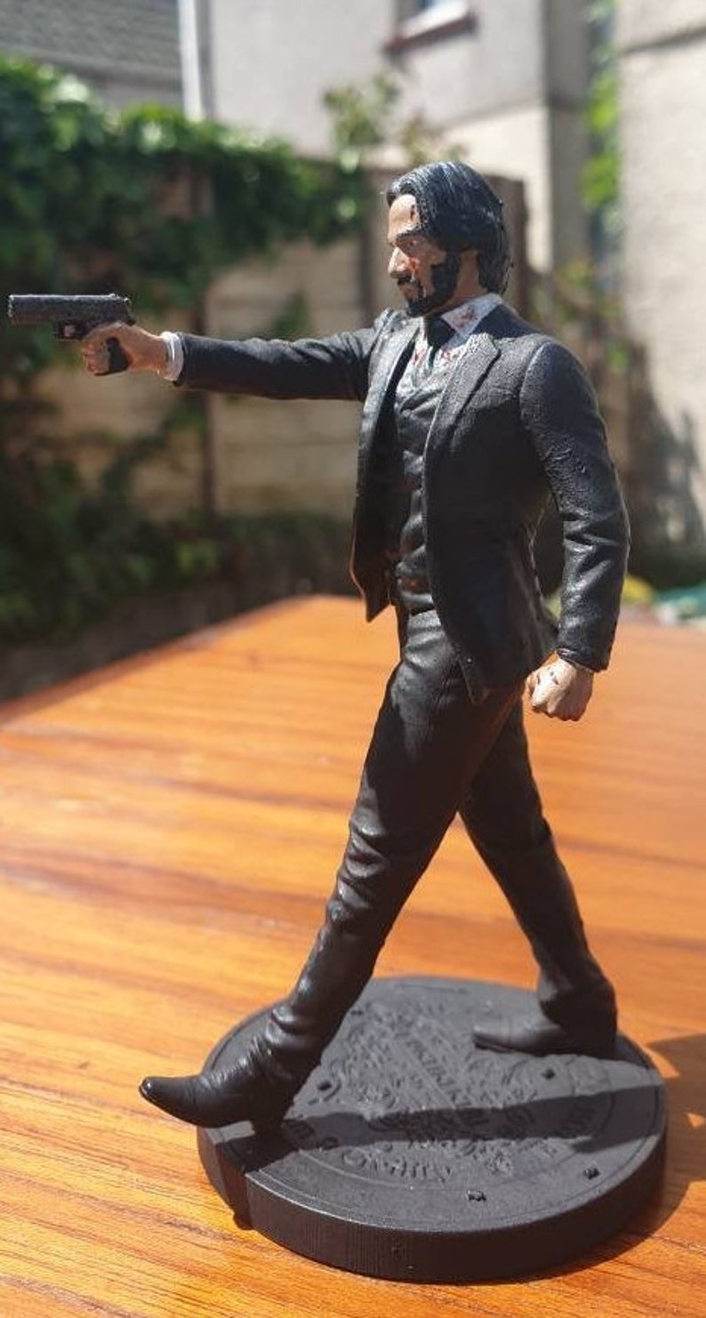 john wick catacombs statue