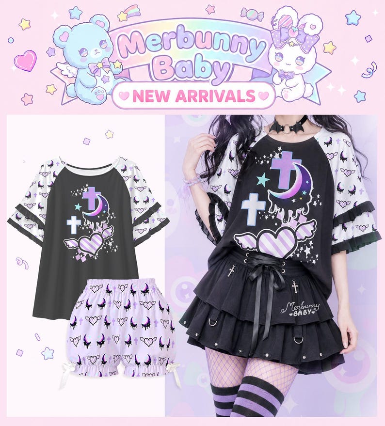 May include: A black and white raglan t-shirt with ruffled sleeves and a graphic print of a purple crescent moon, a cross, and a winged heart, paired with light purple shorts featuring a repeating pattern of moons, hearts, and crosses.