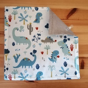 Children's napkin lined with bamboo terry Dinosaures bleus