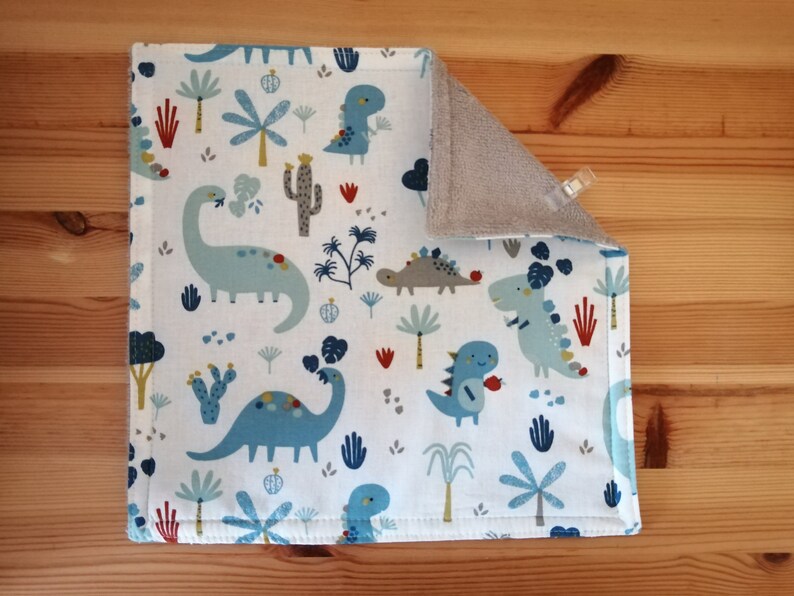 Children's napkin lined with bamboo terry Dinosaures bleus