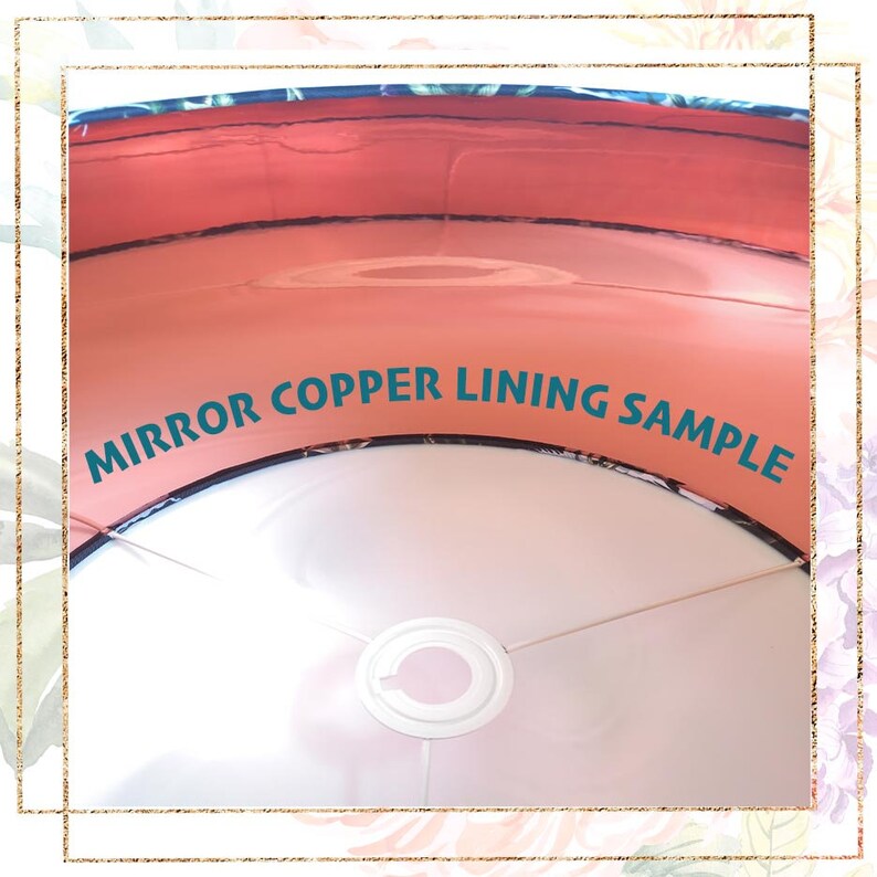 May include: A lampshade interior with a mirror copper lining. The interior is a salmon colour, and the exterior has a floral pattern with blue and green leaves. The text "MIRROR COPPER LINING SAMPLE" is printed on the interior.