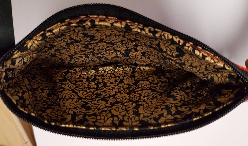 Handmade rose seatbelt webbing coin purse.