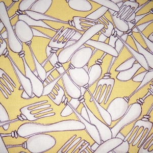 May include: A yellow background with a pattern of white forks and spoons. The forks and spoons are overlapping and intertwined.