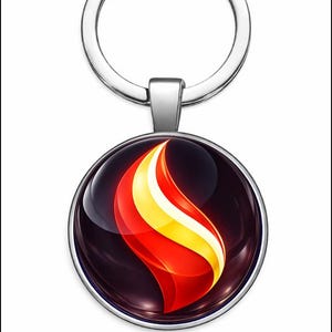 Puede incluir: Un llavero plateado con un colgante redondo que presenta un diseño de llama estilizada en rojo, amarillo y blanco sobre un fondo oscuro. El llavero tiene un anillo plateado para sujetar llaves.