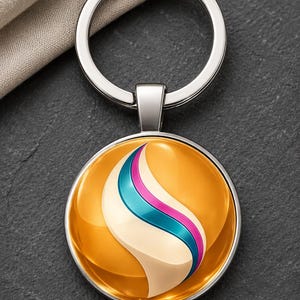 May include: A circular keychain featuring a polished silver metal ring and a domed glass cabochon. The center design displays a vibrant orange background with a stylized, swirling wave pattern in cream, teal, and magenta. The text Neptune's Corner is visible.