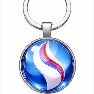 Puede incluir: Un llavero redondo plateado con un colgante azul y blanco. El colgante presenta un diseño estilizado con elementos blancos, rojos y morados. Un accesorio sencillo pero elegante.