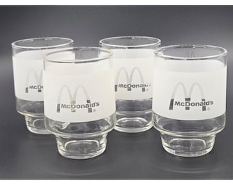 Juego de 4 vasos de vidrio esmerilado vintage para jugo de naranja de McDonald's con los Arcos Dorados.