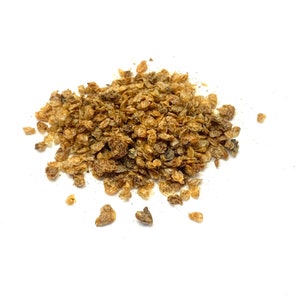 May include: A close-up of a pile of dried, light brown coriander seeds.