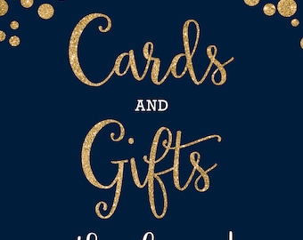 May include: A navy blue sign with gold glitter confetti at the top. The sign says "Cards and Gifts thank you!" in white text with gold glitter.