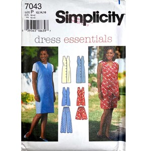 May include: Simplicity dress essentials sewing pattern. The pattern features a blue dress, a red floral dress, and other dress variations. The pattern includes sizes 12, 14, and 16. The image shows a woman wearing a blue dress.