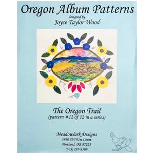 May include: A light blue pattern booklet titled "Oregon Album Patterns" designed by Joyce Taylor Wood. The cover features an oval landscape design with yellow, blue, and pink floral accents. The title "The Oregon Trail" is also displayed.