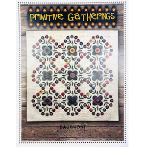May include: A quilt pattern titled "DAURMONT" with the text "Primitive Gatherings" at the top. The quilt design features floral patterns in various colors, including red, blue, and yellow. The finished size is 72" x 72".