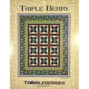 May include: Quilt pattern for a Triple Berry quilt. The pattern features a quilt block with a red, white, and black design. The quilt is 72 x 88 inches. The pattern is by Thimbleberries by Lynette Jensen.