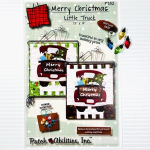 May include: A clear plastic package featuring a Christmas-themed craft pattern. The pattern includes a red truck with the words "Merry Christmas," measuring 12" x 14". Additional elements include gift boxes, Christmas lights, and the text "Skill Level: EASY."