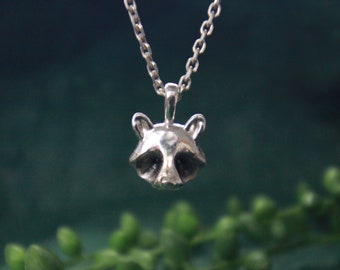 blackened tiny sterling silver racoon pendant