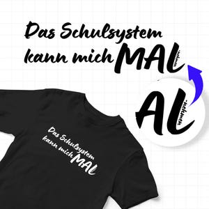 May include: Black t-shirt with the German phrase "Das Schulsystem kann mich MAL" in white script. A circular graphic with the letters "AL" and the word "-nehmen" is also present.