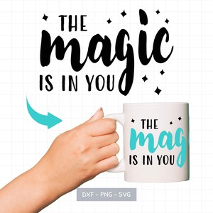 May include: White ceramic mug with the text "THE magic IS IN YOU" in black and teal. The mug is held by a hand. The design includes star accents. The image also includes the file types: DXF - PNG - SVG.
