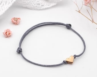 Delicate macrame bracelet with heart in silver, gold or rose gold color and adjustable sliding knot closure