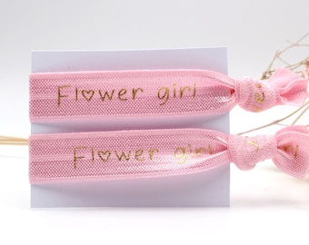 2tlg. Elastisches Armband Set Flower girl rosa mit goldfarbener Schrift für Blumenmädchen