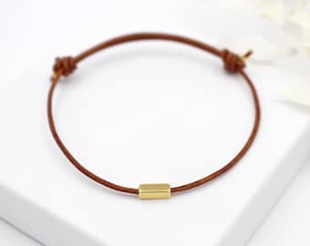 Lederarmband 1,5mm braun Tube gold- oder silberfarben