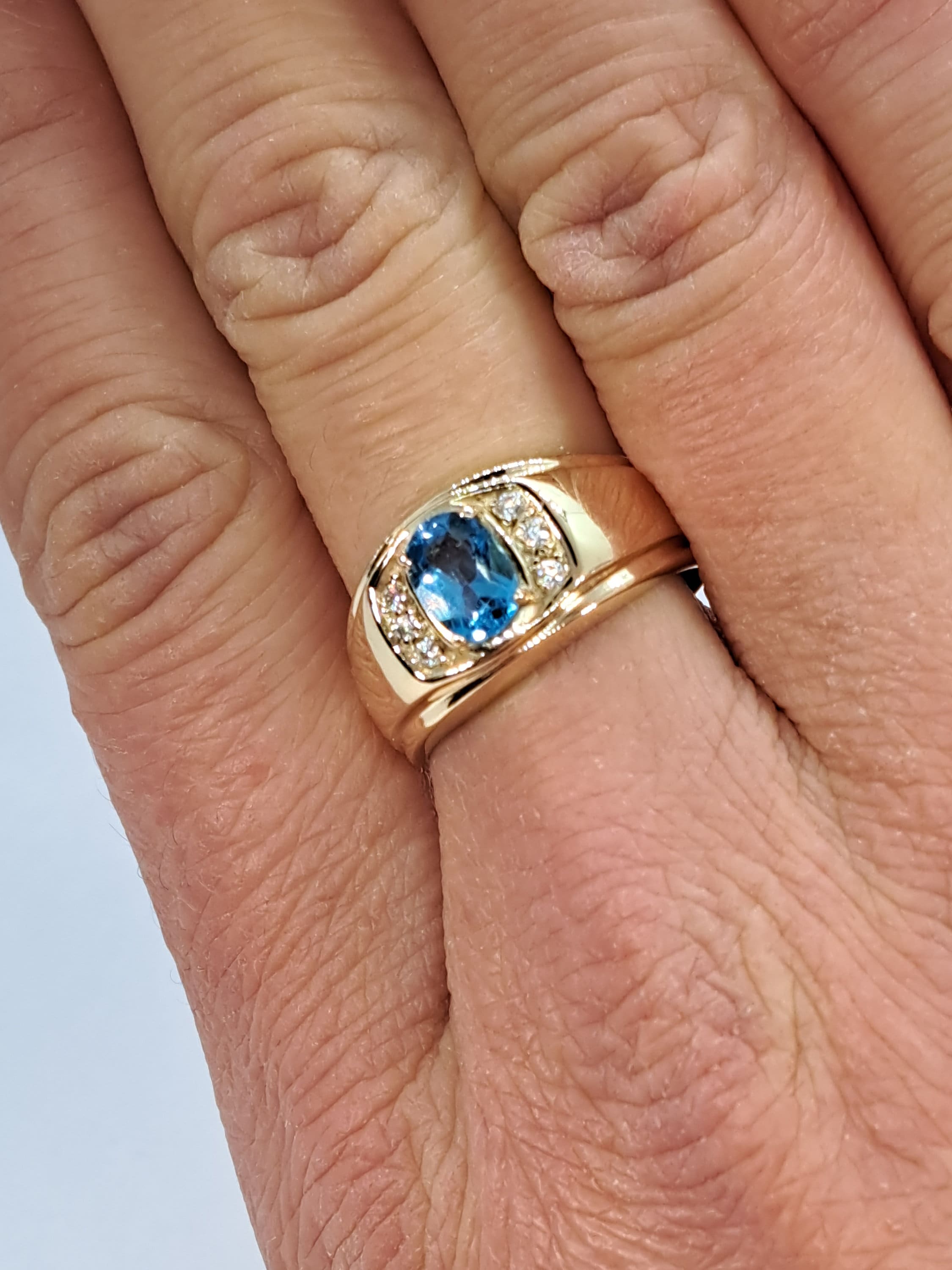 Mens gold ring with blue stone best sale