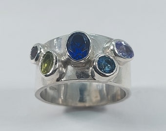 Sterlingzilveren ring met meerdere stenen, peridot, blauwe topaas, amethist, tanzaniet, saffier