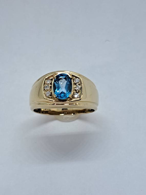 Men's 6.0mm Swiss Blue Topaz and 1/20 CT. T.W. Diamond Stepped Edge Ring in  Sterling Silver | Zales