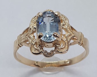 Oval Blue Topaz 10k Yellow Gold Ring, December Birthstone