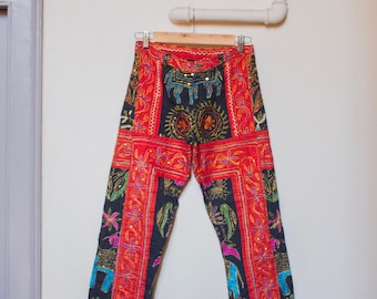 Handcrafted in India black and red cotton hand embroidered trumpet leg mid rise trousers with floral and animals pattern (XS)